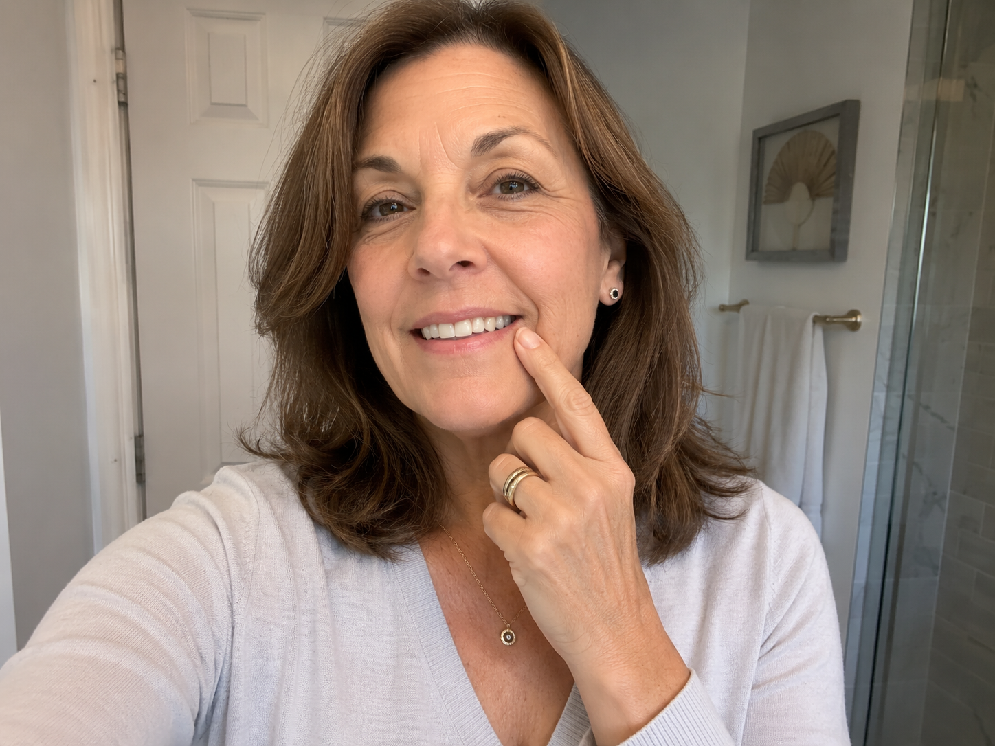 Dorothy K. smiling in bathroom